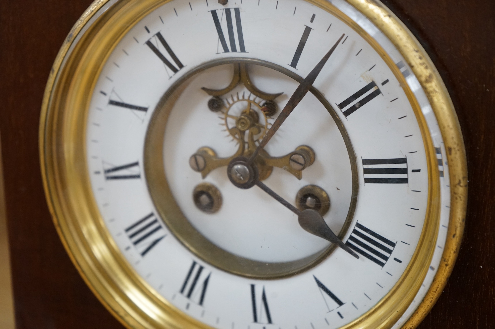 A mahogany mantel clock, with enamel dial visible Brocot escapement, 33cm high. Condition - fair, untested